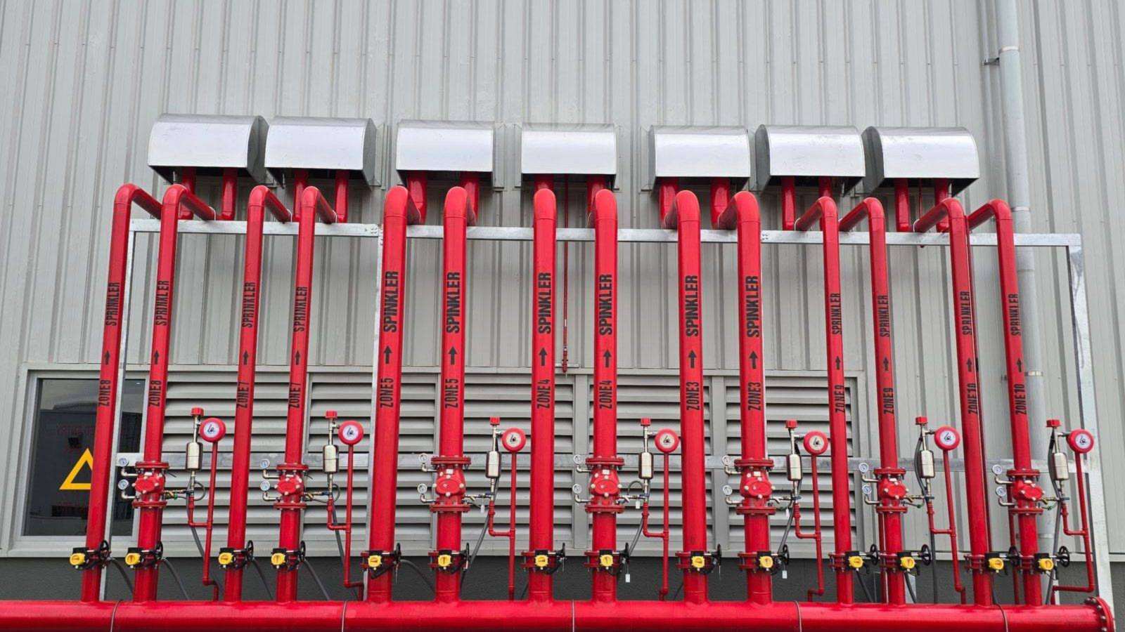 Industrial sprinkler pipework and grooved fittings for a fire water system